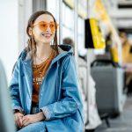 Female passenger using public transport
