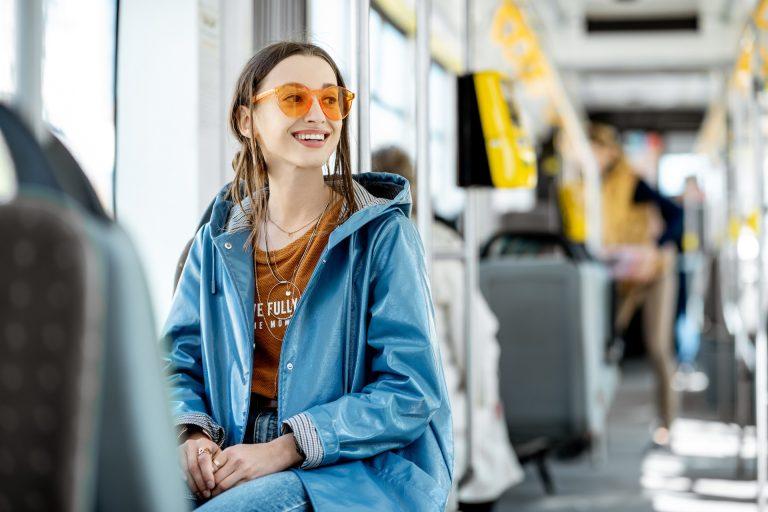Female passenger using public transport